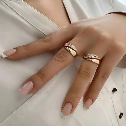 Elegant Golden Ring with Sparkling Stones