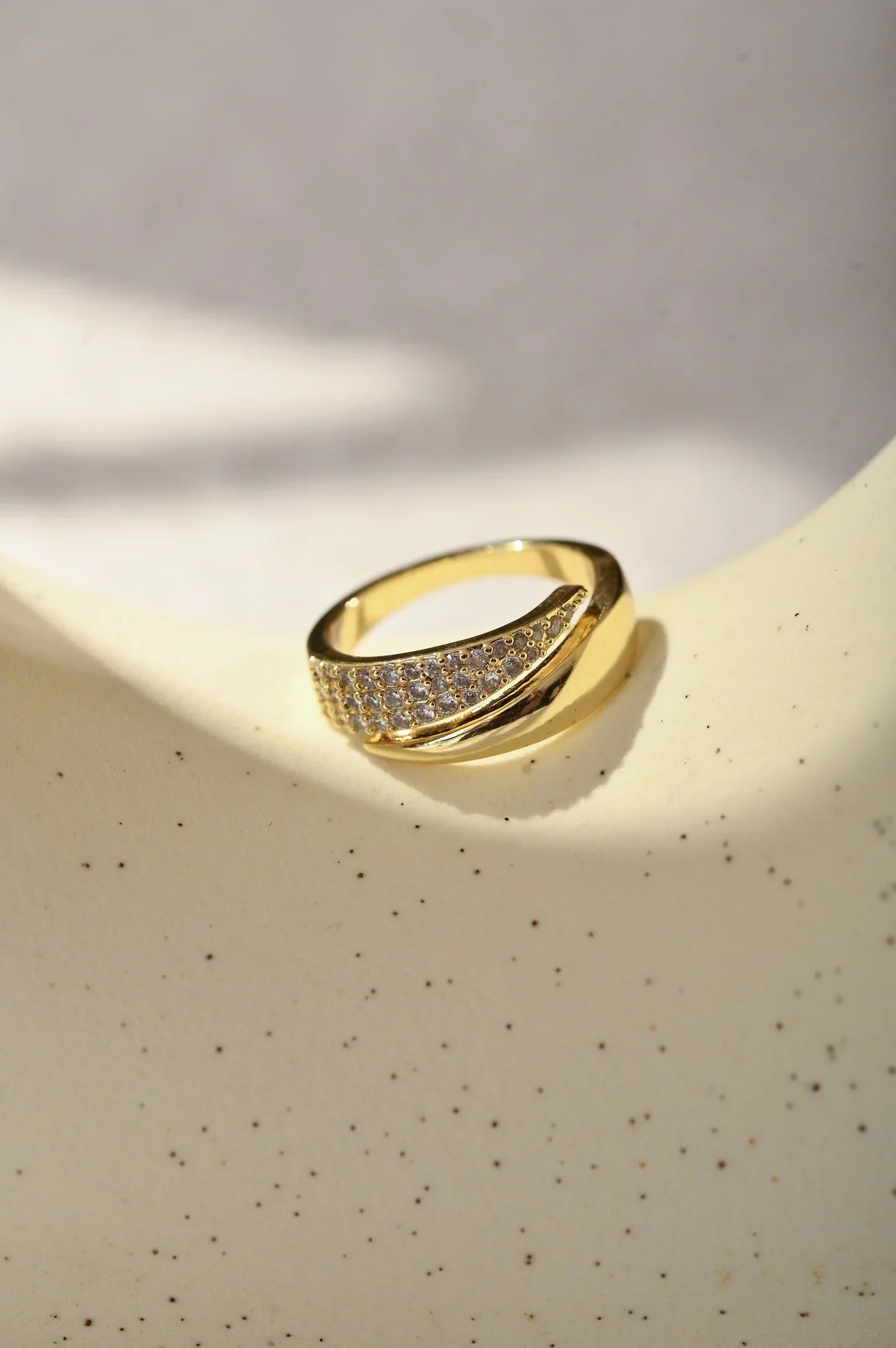 Elegant Golden Ring with Sparkling Stones
