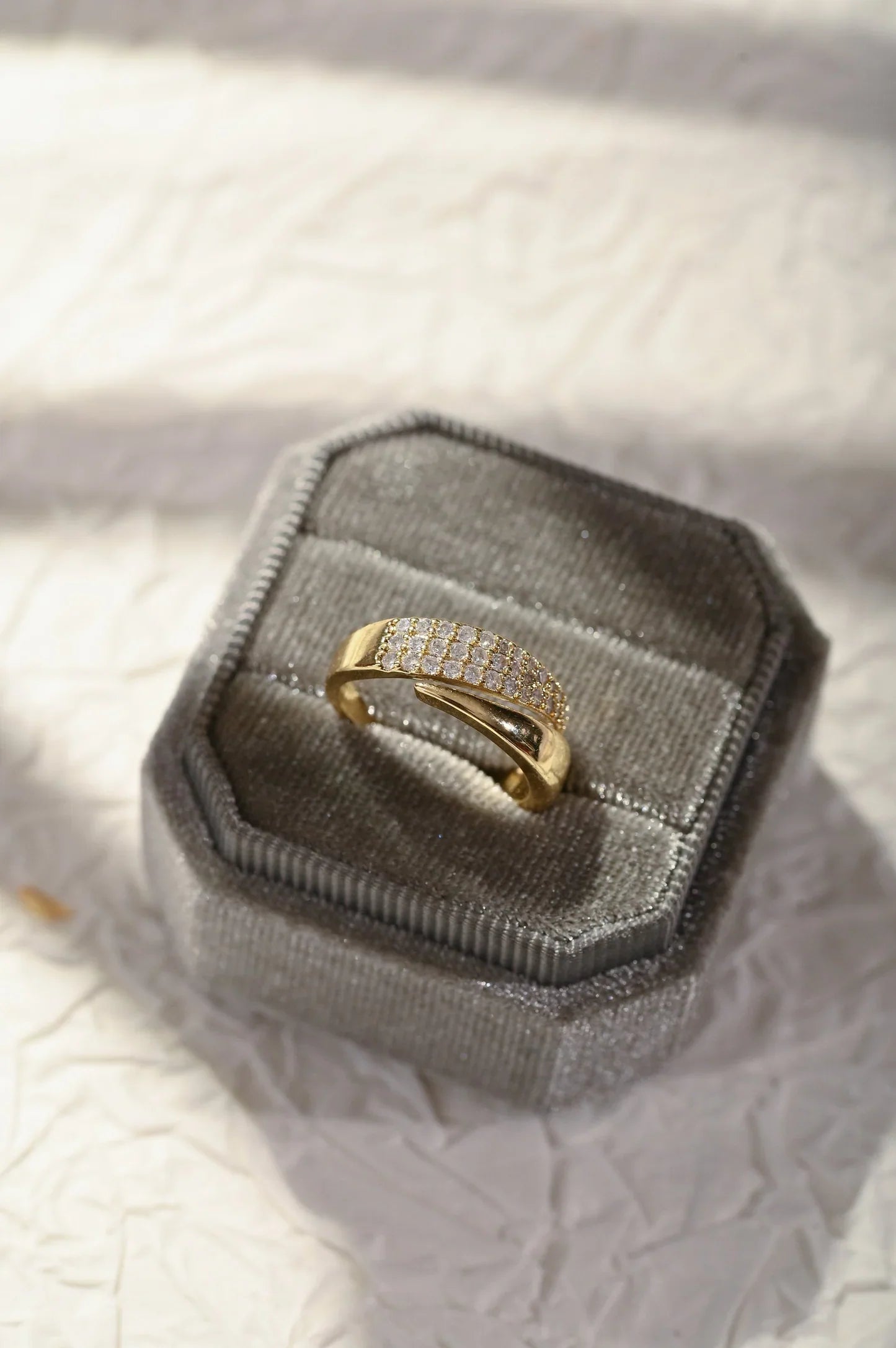 Elegant Golden Ring with Sparkling Stones